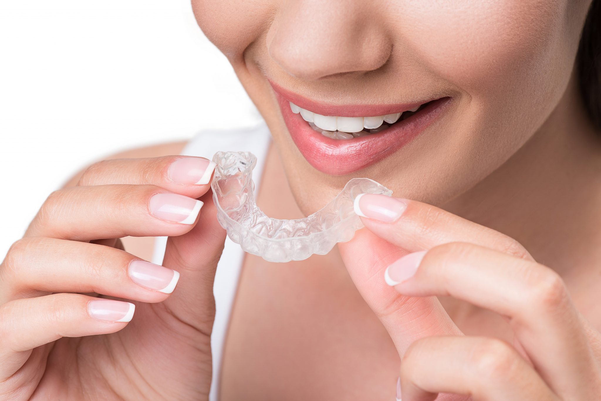 Joyful Young Woman Undergoing Clear Aligner Treatment